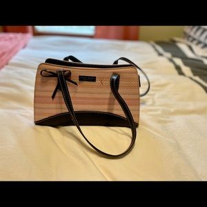 KATE SPADE pink and black self stand purse